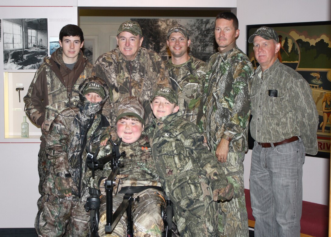 Members and volunteers of the Outdoor Dream Foundation pose for a photo before hunting for deer at Richard B. Russell Lake, Oct. 26, 2013. Three brothers Jacob, Noah and Isaac Bowman (pictured front row from left to right) participated in the deer hunt with help from ODF members and volunteers (pictured back row from left to right) Jonathan Jones, Brad Jones (Founder of Outdoor Dream), Jared McKinsey, Shannon McKinsey, and Greg Darnell. Noah harvested his first deer during the hunt.