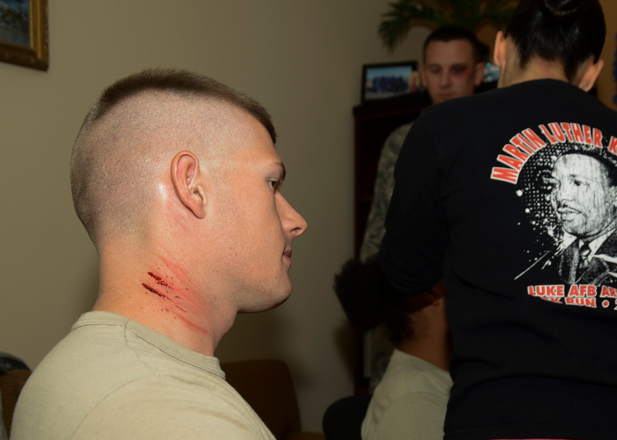 Staff Sgt. Brandon Harris, 412th Maintenance Logistics Squadron, volunteered with his wife to show that domestic violence or maltreatment can sometimes be mutual between partners. (U.S. Air Force photo by Rebecca Amber)