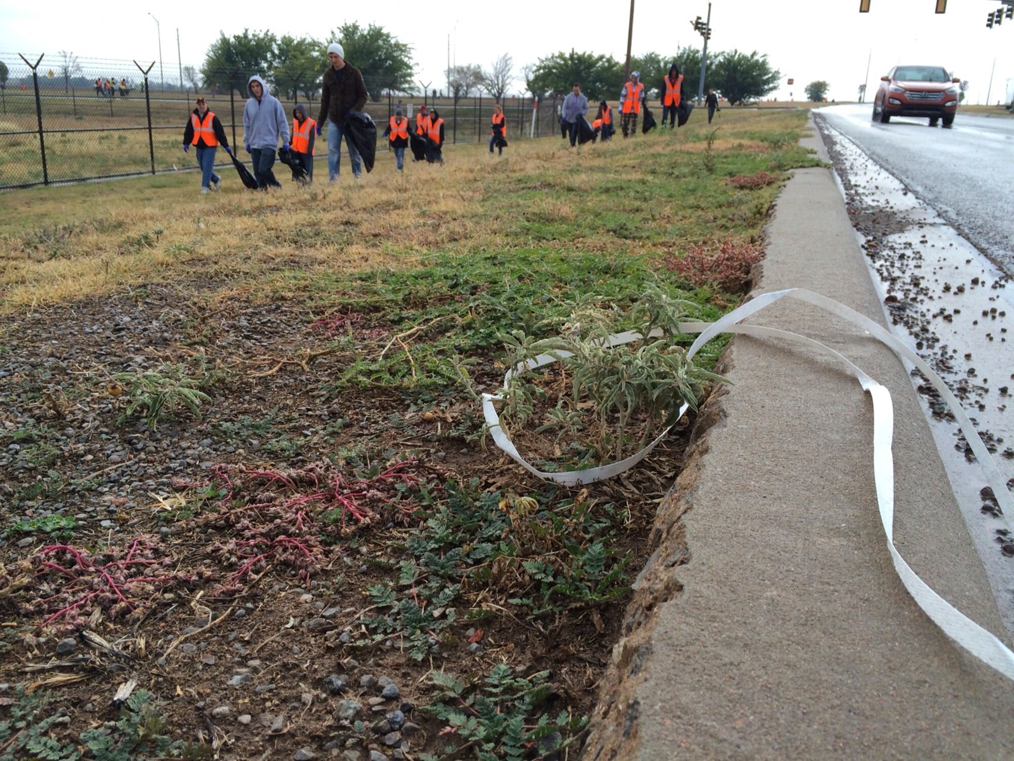 ALTUS AIR FORCE BASE, Okla. – Trash sits near Veterans Drive outside of Altus AFB Oct. 26, 2013. More than 75 volunteers spent the morning picking up trash off base as part of Clean Up Altus. (U.S. Air Force photo by Staff Sgt. Nathanael Callon/Released)