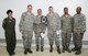 U.S. Air Force Col. Nancy Bozzer, far left, 100th Operations Group commander, and U.S. Air Force Maj. Rofelio Grinston, 100th Aircraft Maintenance Squadron commander, far right, pose with members of the maintenance crew for a KC-135 Stratotanker, tail number 63-8027, assigned to RAF Mildenhall Oct. 22, 2013, while visiting Moron Air Base, Spain. The crew received a personalized plaque emblazoned with the signature “Square D” for their efforts in attaining zero discrepancies for the aircraft, making it a black-letter aircraft. The plaque will be displayed in the 100th Aircraft Maintenance Squadron as a reminder of the maintenance crew’s achievement. (U.S. Air Force photo by Airman 1st Class Dillon Johnston/Released)  