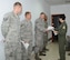U.S. Air Force Col. Nancy Bozzer, right, 100th Operations Group commander, hands letters of appreciation to members of the maintenance crew for a KC-135 Stratotanker, tail number 63-8027, Oct. 22, 2013, at Moron Air Base, Spain. This aircraft received a black-letter initial on its discrepancy report after the crew at Moron AB helped reduce its discrepancy total to zero. Assigned to RAF Mildenhall, this is the first black-letter aircraft since 2006. (U.S. Air Force photo by Airman 1st Class Dillon Johnston/Released)