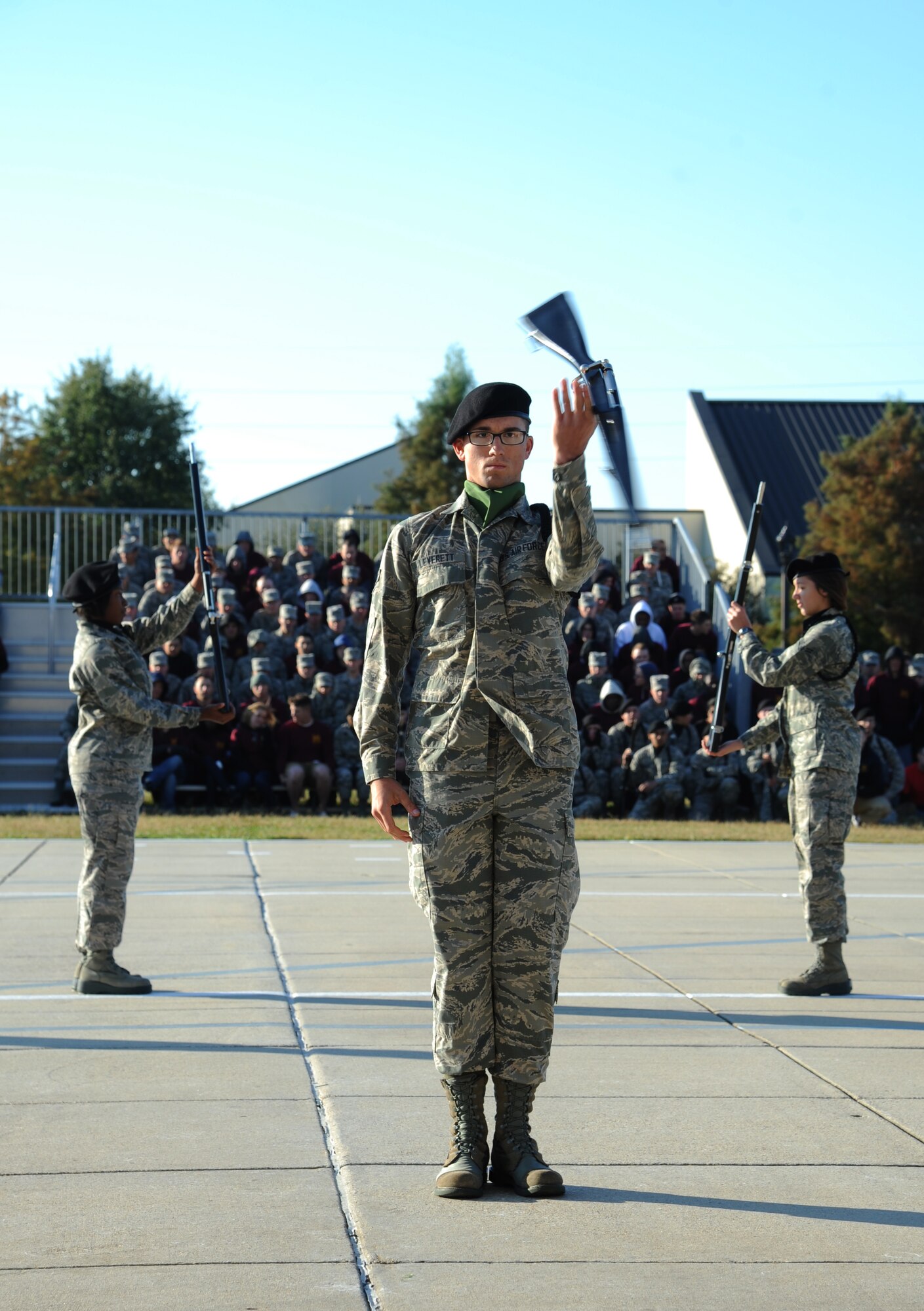 Airman 1st Class Jesse Leverett, 334th Training Squadron, spins a rifle as he serves as drill master for the freestyle portion during the 81st Training Group drill down competition Oct. 25, 2013, at the Levitow Training Support Facility, Keesler Air Force Base, Miss.  (U.S. Air Force photo by Kemberly Groue)