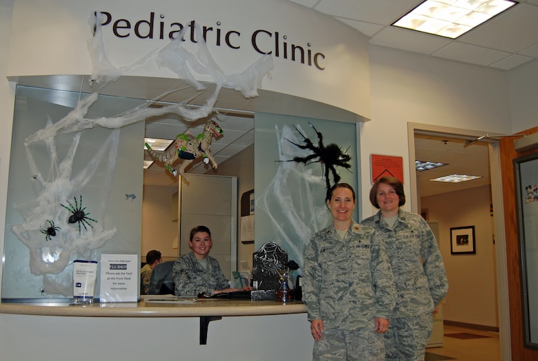 PETERSON AIR FORCE BASE, Colo. – (Left to right) Airman 1st Class Jacobi Lee, Maj. Patti Demotts and Capt Kristen Oster 21st Medical Operations Squadron, all work at the Peterson pediatric clinic. The pediatric clinic provides professional and thoughtful medical care to the thousands of children living on base and in the surrounding community. (U.S. Air Force photo/Michael Golembesky)