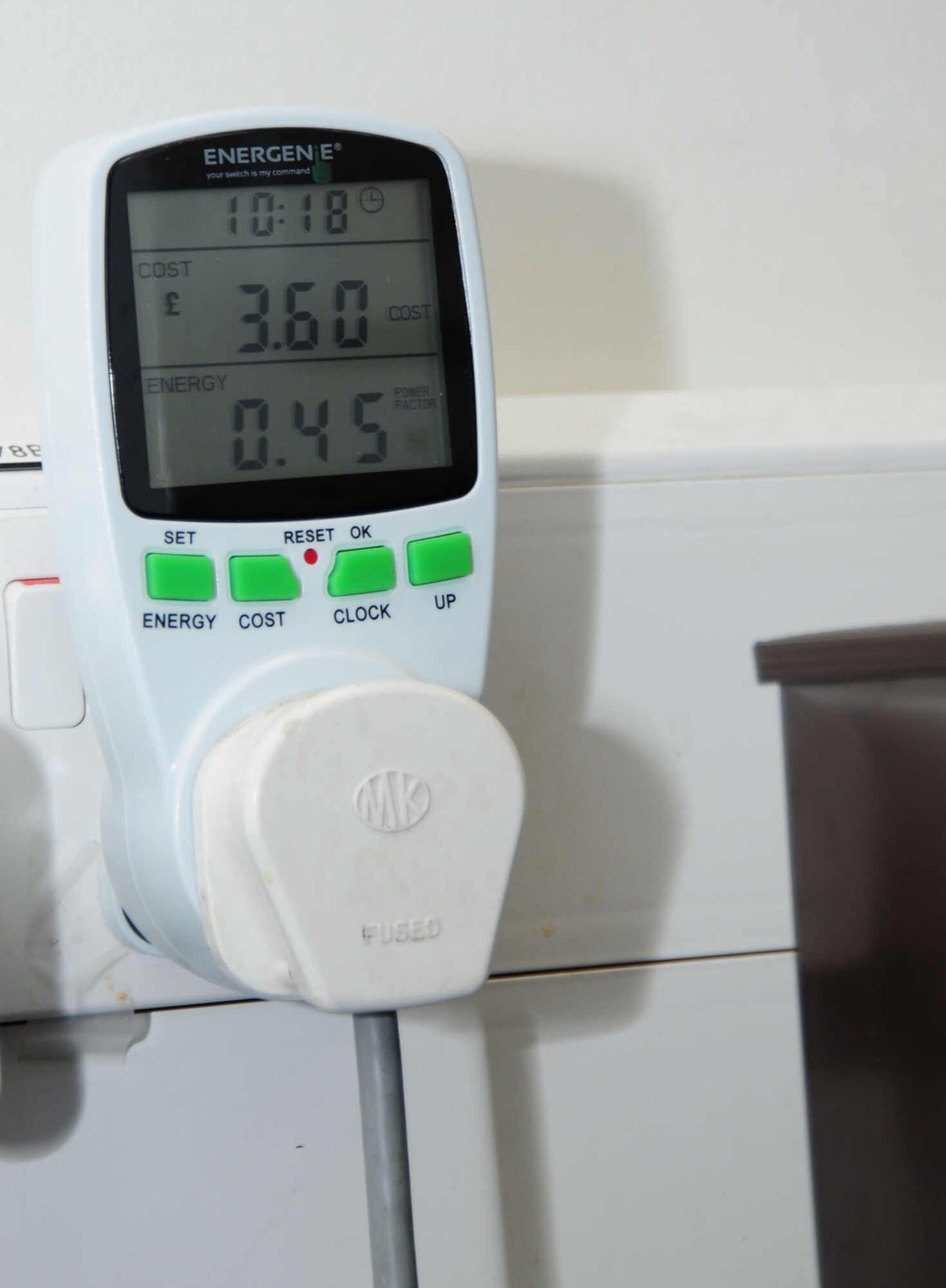 Plug-in meters are available for use in workplace facilities on RAF Mildenhall, England, to track the energy consumption of electrical devices such as refrigerators. Facility managers are advised to pick some up for their building. There is also energy-awareness training for facility managers, which provides information on ways to monitor and reduce energy consumption. (U.S. Air Force photo by Karen Abeyasekere/Released) 