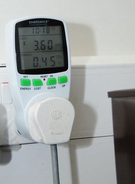 Plug-in meters are available for use in workplace facilities on RAF Mildenhall, England, to track the energy consumption of electrical devices such as refrigerators. Facility managers are advised to pick some up for their building. There is also energy-awareness training for facility managers, which provides information on ways to monitor and reduce energy consumption. (U.S. Air Force photo by Karen Abeyasekere/Released) 