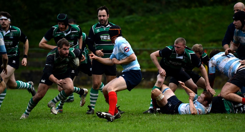 SPANGDAHLEM AIR BASE, Germany--Elliot Curtis, a 52nd Force Support Squadron Eifel Arms Inn shuttle driver from Fort Walton Beach, Fla., runs during a rugby game at the University of Trier Rugby Pitch Oct. 12, 2013. The University of Trier Rugby team won the championship for the region liga three times out of the last five years. (U.S. Air Force photo by Senior Airman Rusty Frank/Released)