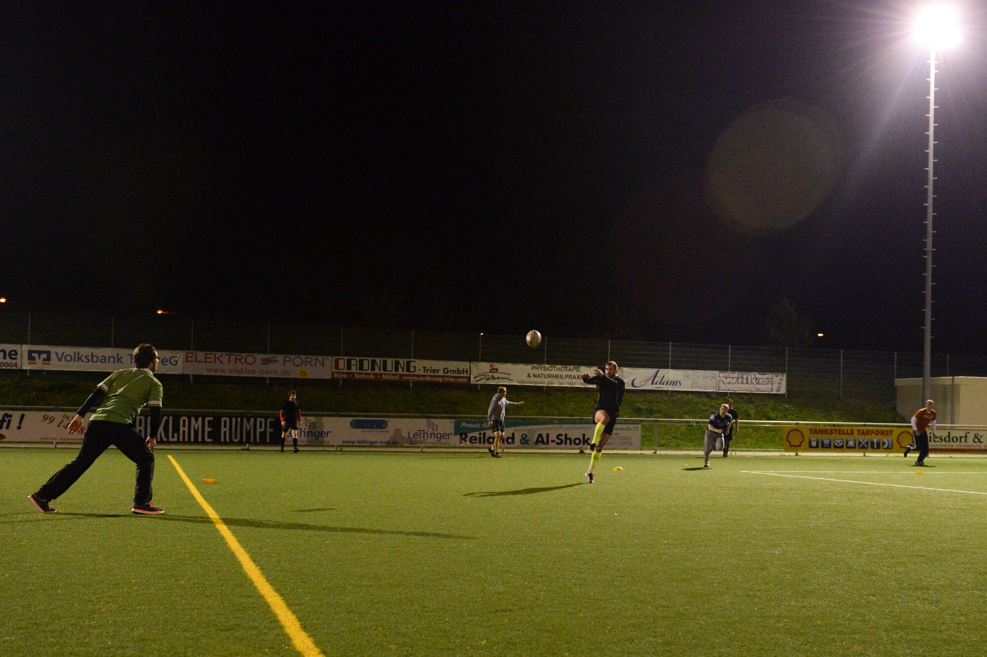 SPANGDAHLEM AIR BASE, Germany--Elliot Curtis, a 52nd Force Support Squadron Eifel Arms Inn shuttle driver from Fort Walton Beach, Fla., prepares to catch a rugby ball during practice Oct. 10, 2013. Curtis first started getting involved in rugby more than three years ago. (U.S. Air Force photo by Senior Airman Rusty Frank/Released)