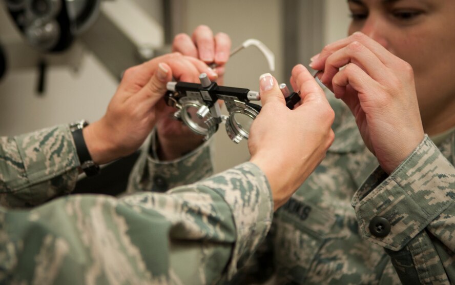 A patient tries on a pair of trial frames at Moody Air Force Base, Oct. 22, 2013. Employees at Moody’s optometry clinic order about 2,800 pairs of eyewear annually, including gas mask inserts and ballistic eyewear. 
(U.S. Air Force photo by Airman 1st Class Sandra Marrero/Released)
