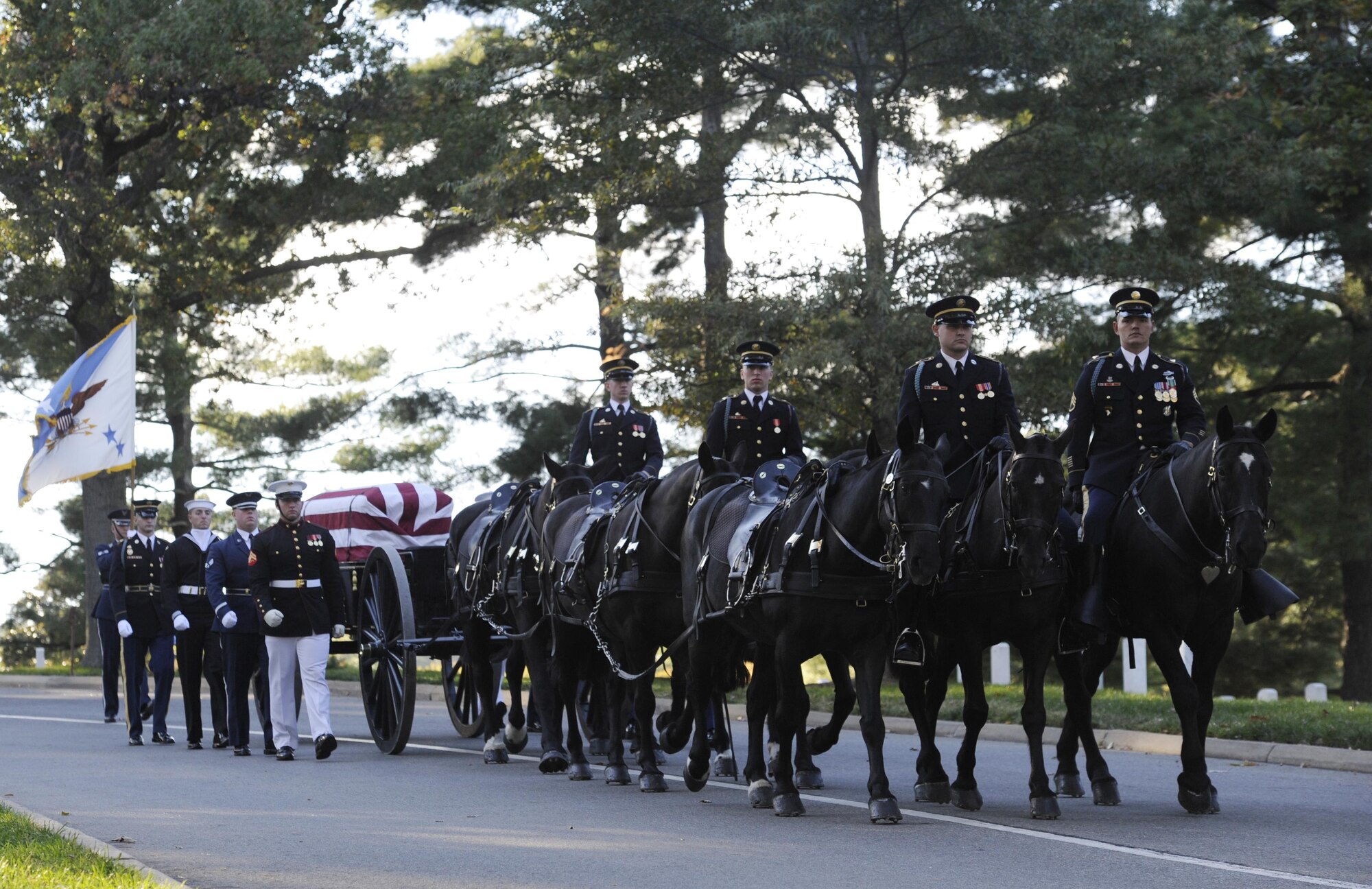 U.S. Army, Caisson Platoon, 3d U.S. Infantry Regiment (The Old Guard) leads a joint service casket team, carrying retired Gen. David C. Jones to his final resting place Oct. 25, 2013, at Arlington National Cemetery, Va. Jones served four years as Air Force chief of staff from 1974 to 1978 until he was appointed as chairman of the Joint Chiefs of Staff June 21, 1978. As chairman, Jones served longer than all of his predecessors, serving from 1978 to 1982. During this time he was responsible for executing the decisions of the National Command Authorities regarding worldwide readiness and employment of combat forces of the U.S. Army, Navy, Air Force and Marine Corps.