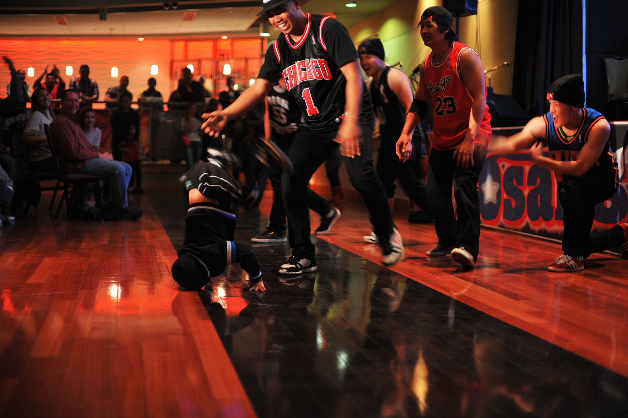 The Osan “B-Boys” break dance group performs during the ‘Osan’s got talent’ contest at Osan Air Base Republic of Korea, Oct. 26, 2013. Contestants went up against 17 other competing acts. (U.S. Air Force photo/Staff Sgt. Emerson Nuñez)