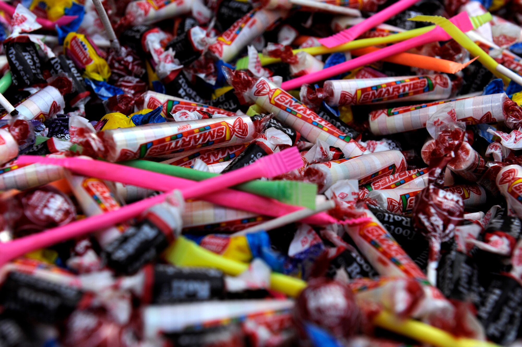 Candy is piled inside car trunks during the trunk-or-treat portion of the 2013 Fall Harvest Festival on Kadena Air Base, Japan, Oct. 26, 2013. The second annual event included food and games as well as pie-eating and costume contests. (U.S. Air Force photo by Senior Airman Maeson L. Elleman)