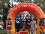 Armed Forces Runners take the overall Marine Corps Marathon top three positions:  1st- CPT Kelly Calway (Army)  Fort Carson, CO – 2:42:16; 2nd- LT Gina Slaby (Navy) JEB Virginia Beach, VA – 2:48:02; 3rd- SrA Emily Shertzer (USAF) Fort Indiantown Gap, PA – 2:48:08
