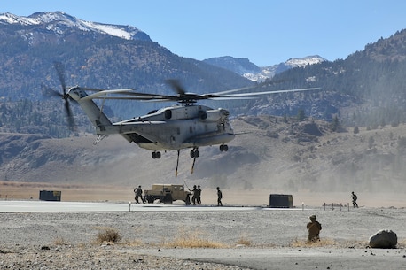 Marines with Landing Support Company, Combat Logistics Regiment 17, 1st Marine Logistics Group, conduct a helicopter support team training operation during Mountain Exercise 6-13, aboard Marine Corps Mountain Warfare Training Center in Bridgeport, Calif., Oct. 18, 2013. During the exercise, a small detachment of Marines from 1st MLG provided logistical support to 1st Battalion, 5th Marine Regiment, 1st Marine Division. 