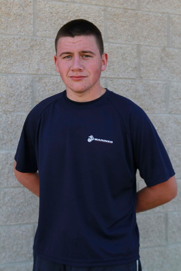 Jesse Flanagan poses for a photo during a Marine Corps pool function in Livonia, Mich., Sept. 9, 2013. Flanagan, 19, had been traveling with his parents, who are missionaries, before journeying more than 8,000 miles back home to join the Marine Corps.  (U.S. Marine Corps photo by Sgt. Elyssa Quesada/Released)