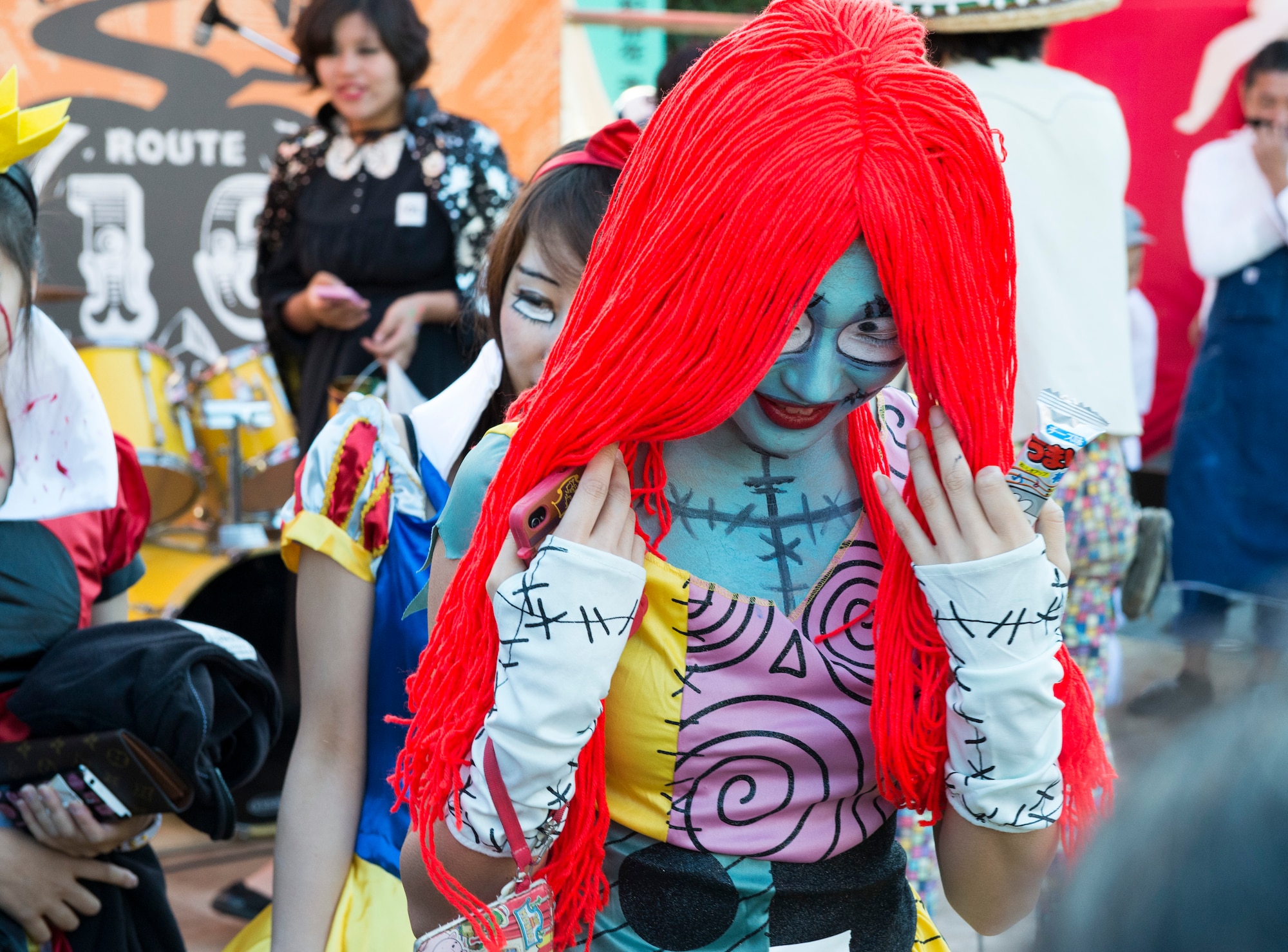 A local Japanese citizen walks off stage during a costume contest at Fussa, Japan, Oct. 27, 2013. The woman was dressed as ‘Sally’ from the movie The Nightmare Before Christmas. (U.S. Air Force photo by Senior Airman Cody H. Ramirez)