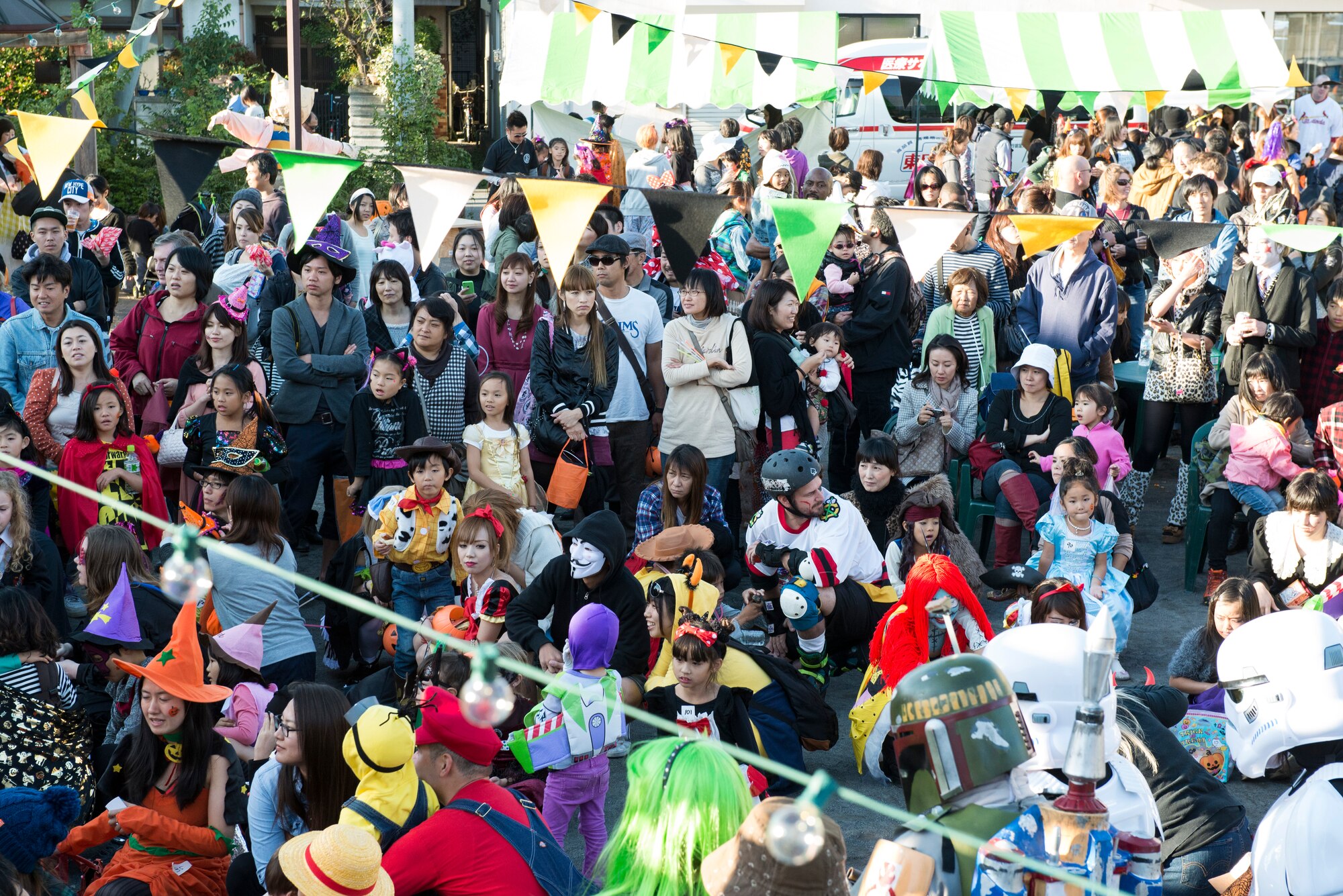 Costume contestants wait for their turn in a Halloween festival costume contest at Fussa, Japan, Oct. 27, 2013. The festival is just outside Yokota Air Base, Japan, each year, allowing U.S. service members and local Japanese citizens to share the culture of Halloween together. (U.S. Air Force photo by Senior Airman Cody H. Ramirez)