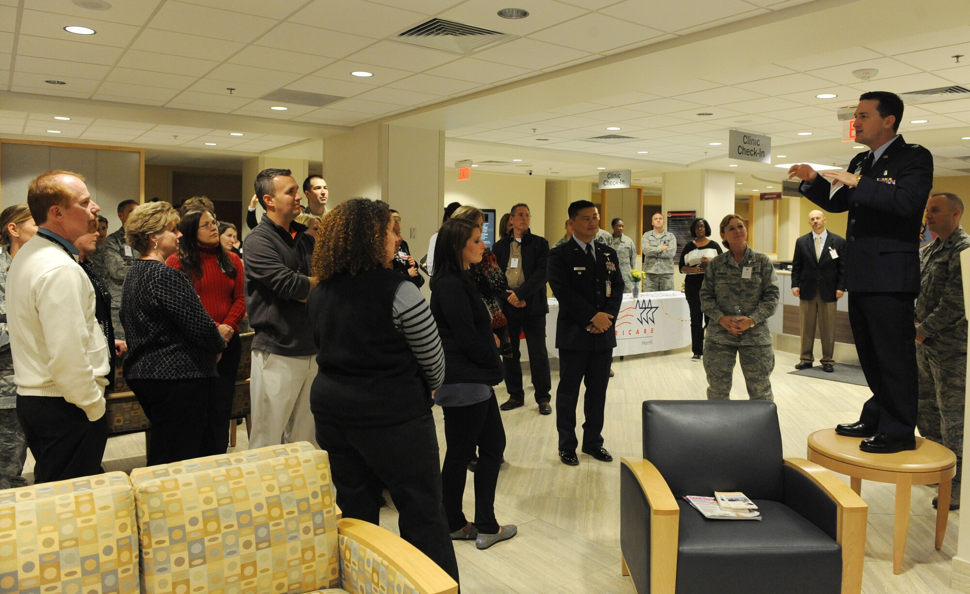 Col. Bret Burton thanks military, off-base medical providers and Health Net Federal Services employees for attending the appreciation dinner during the network social at the 375th Medical Group Oct. 24.  After dinner, guests were invited to tour the laboratory, radiology, pharmacy, physical therapy and a family health exam room so they would understand how the clinic is ran.  Burton is the 375th MG commander.  (U.S. Air Force photo by Staff Sgt. Maria Bowman)