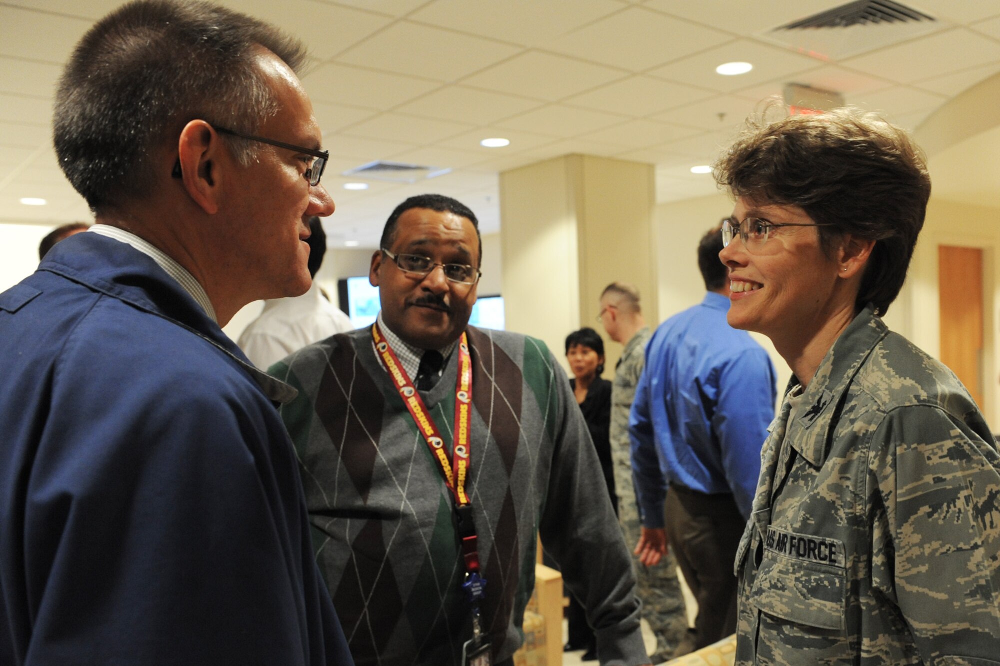 Col. Tammy Lindsay talks with off-base medical providers during the network social at the 375th Medical Group Oct. 24.  During the event, off-base network providers were offered at tour of the laboratory, radiology, pharmacy, physical therapy and a family health exam room so they would understand how the clinic is ran.  Lindsay is from the 375th MG.  (U.S. Air Force photo by Staff Sgt. Maria Bowman)
