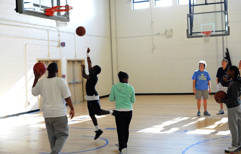 Special-needs students from DuVal High School in Lanham, Md., play basketball at the West Fitness Center at Joint Base Andrews, Md., on Oct. 30, 2013. The event was held in recognition of National Disability Employment Awareness Month observed in November. (U.S. Air Force photo/Airman 1st Class Joshua R. M. Dewberry)