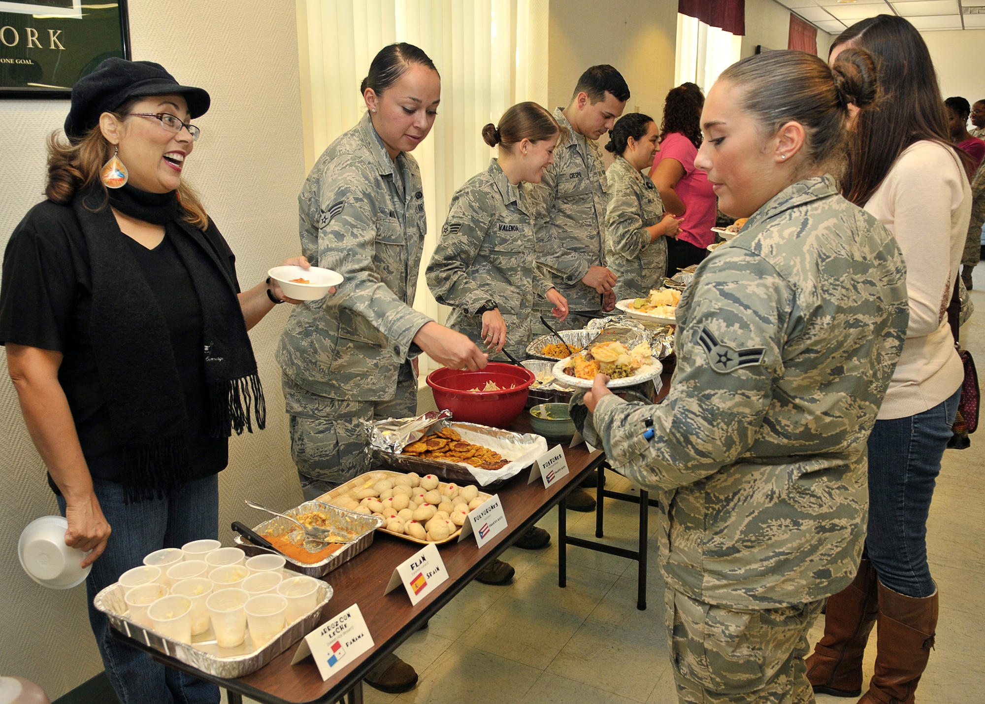 Volunteers at the Hispanic Heritage Month luncheon prepared dishes from their representative countries to highlight cultural diversity, while providing a tasty lunch to guests Oct. 25 at Chapel 2.  Some dishes included Panamanian arroz con leche, Spanish flan and Puerto Rican tostones, which were served to guests during the Hispanic Heritage Month. (U.S. Air Force photo by Airman 1st Class Sergio A. Gamboa)