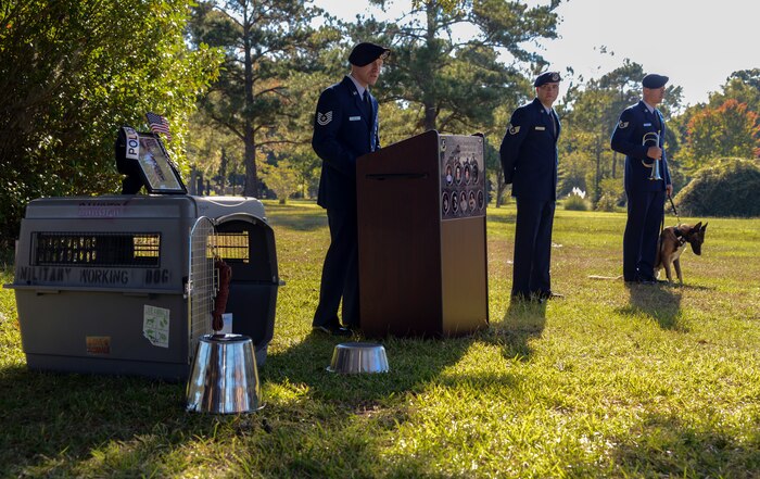 The 628th Security Forces Squadron Airmen hold a burial ceremony for military working dog Athos on Oct. 24, 2013, at Joint Base Charleston – Air Base, S.C. Athos was born Aug. 1998 and passed away Oct. 2012. Athos served as an explosive detector dog for 11 years. He was returned to JB Charleston where his ashes were buried alongside his fellow military working dogs. (U.S. Air Force photo/ Airman 1st Class Chacarra Neal)
