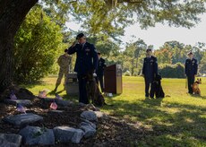 The 628th Security Forces Squadron Airmen hold a burial ceremony for military working dog Athos Oct. 24, 2013, at Joint Base Charleston – Air Base, S.C. Athos was born in August 1998 and passed away in October 2012. Athos served as an explosive detector dog for 11 years. He was returned to JB Charleston where his ashes were buried alongside his fellow military working dogs. (U.S. Air Force photo/Airman 1st Class Chacarra Neal) 

