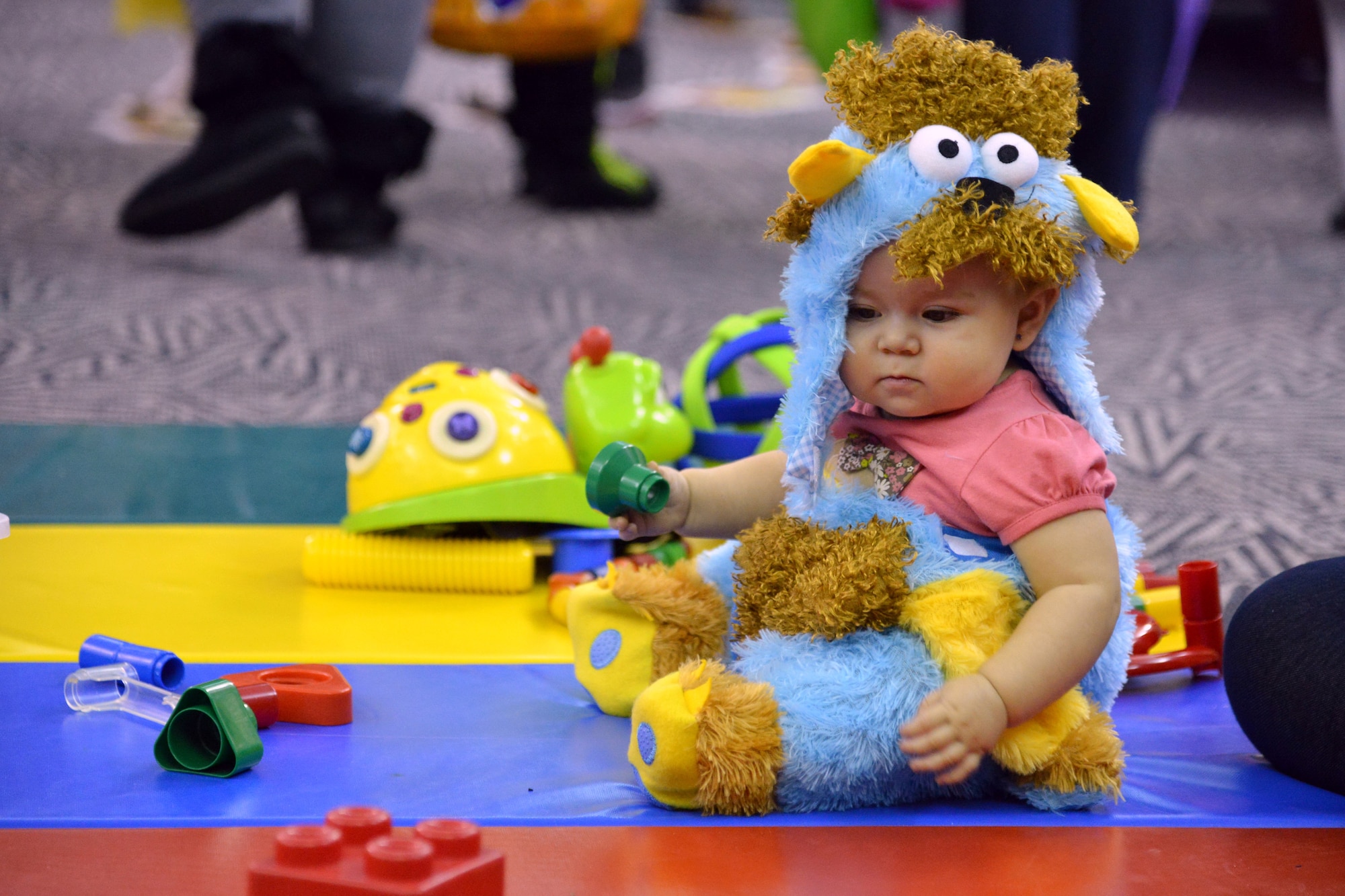 Friday evening’s Bootastic fall carnival at the youth center was a success, with hundreds of children in costume. The carnival featured a haunted house, an obstacle course, a variety of games, dozens of vendors and “trunk-or-treat."  (Photo by Ken Moore)