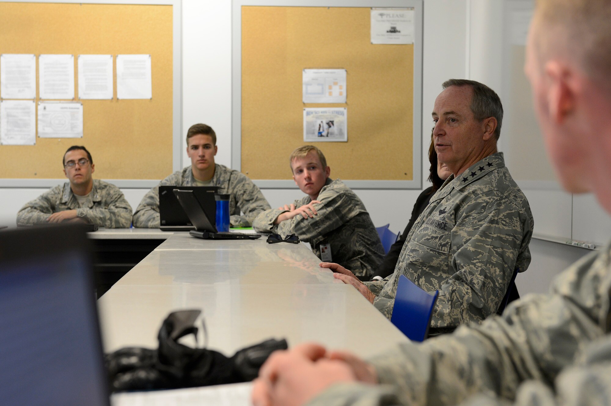 Air Force Chief of Staff Gen. Mark A. Welsh III speaks with cadets during a Behavioral Science 310 class Oct. 28, 2013, U.S. Air Force Academy, Colorado Springs, Colo. Welsh, along with Chief Master Sgt. of the Air Force James Cody, visited with cadets Oct. 28 and 29. Welsh also hosted a cadet call, met with cadets over lunch and teamed with Cody to answer questions during “Stars and Chevrons,” a show on the cadet-run radio station, KAFA 97.7 FM. (U.S. Air Force Photo/Scott Ash)
