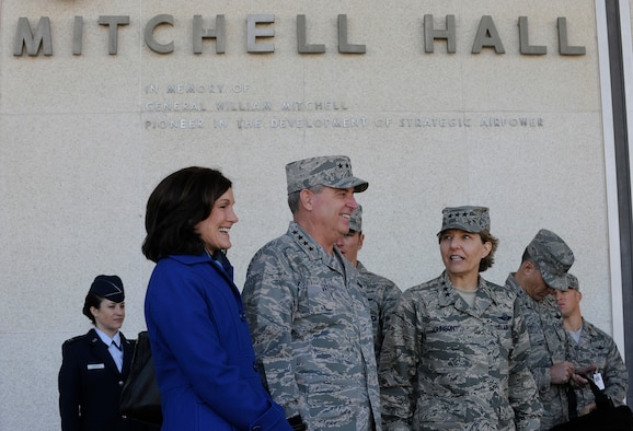 Air Force Chief of Staff Gen. Mark A. Welsh III, his wife, Betty, and Lt. Gen. Michelle Johnson, U.S. Air Force Academy superintendent, stand outside Mitchell Hall to observe cadet formation Oct. 28, 2013, Colorado Springs, Colo. Welsh, along with Chief Master Sgt. of the Air Force James Cody, visited with cadets Oct. 28 and 29 prior to participating in Air Force senior leader meetings the remainder of the week.  In addition to hosting a cadet call, Welsh met with cadets over lunch and during several classroom visits and teamed with Cody to answer questions during “Stars and Chevrons,” a show on the cadet-run radio station, KAFA 97.7 FM. (U.S. Air Force Photo/Scott Ash)