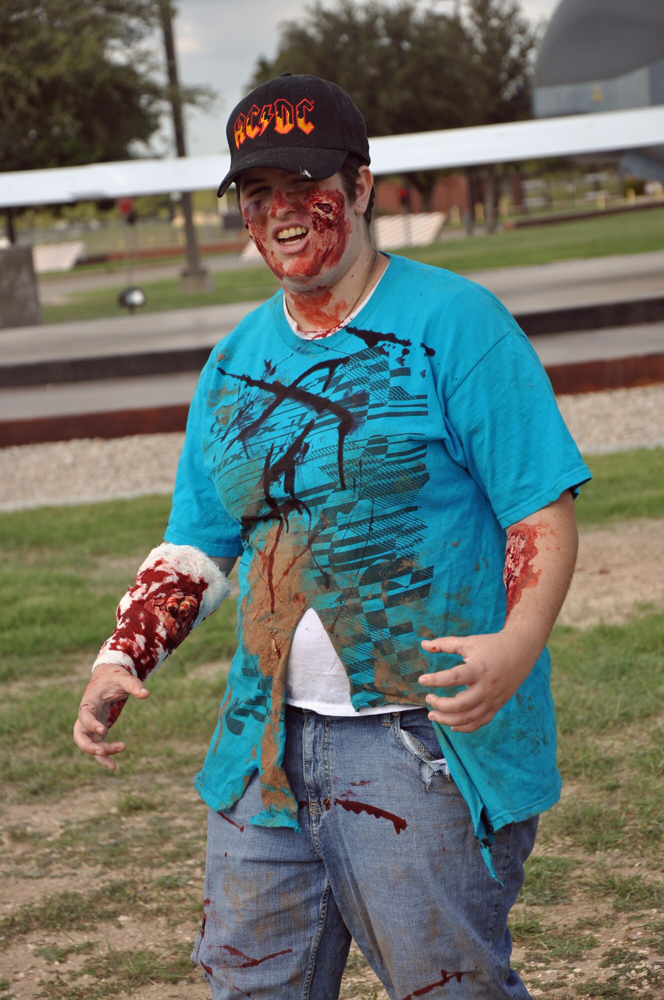 GOODFELLOW AIR FORCE BASE, Texas – Elizabeth Vest, Angelo State University student, poses for a picture before the Zombie Run at the Civil Engineer and Transportation buildings Oct. 27.   The first 25 zombies who showed up in full costume received a free event shirt. (U.S. Air Force photo/ Airman 1st Class Breonna Veal)
