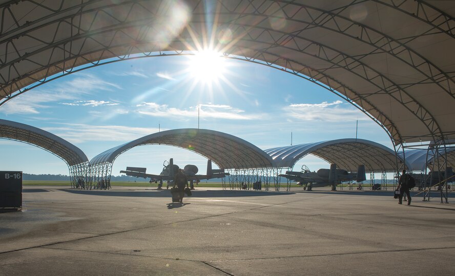 U.S. Air Force Lt. Col. Jeffrey Hogan, 23d Wing director of staff, walks across the flight line at Moody Air Force Base, Ga., Oct. 23, 2013. Hogan flew the 81st Fighter Squadron’s flagship A-10C Thunderbolt II Davis-Monthan AFB, Ariz. where it will replace a retiring aircraft. (U.S. Air Force photo by Airman 1st Class Ryan Callaghan/Released)