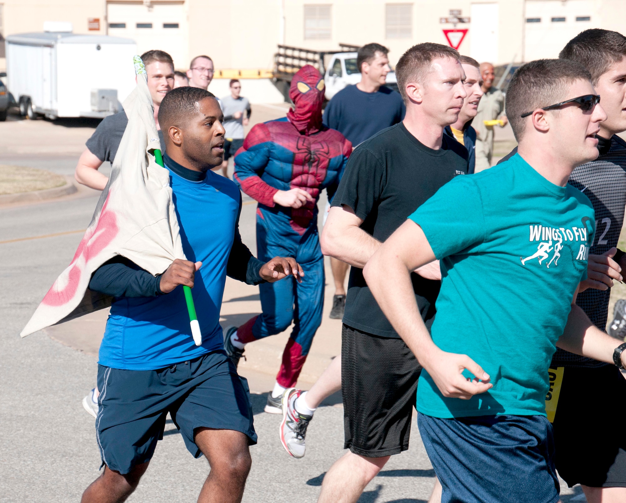 Five-person teams, including the occasional amazing ringer, attempted to protect their flag from the “undead” during the 5K Zombie Fun Run held with Wingman Day, Oct. 24, at Vance Air Force Base, Okla. (U.S. Air Force photo/ Terry Wasson)