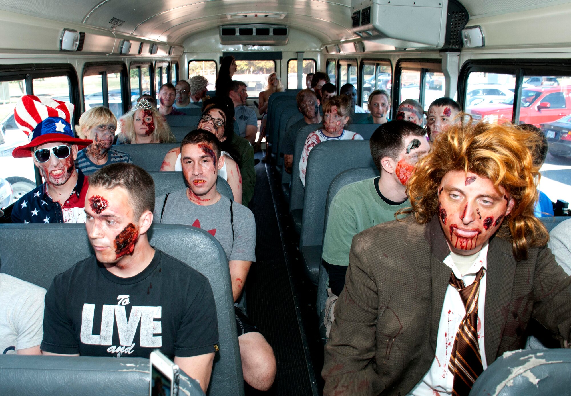 The only thing more frightening than a zombie, is a bus-load of zombies along the 5K Zombie Fun Run route held for Wingman Day, Oct. 24, at Vance Air Force Base, Okla. (U.S. Air Force photo/ Terry Wasson)