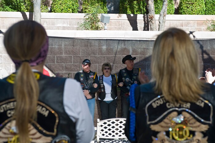 Nation of Patriots members receive a standing ovation during a presentation for wounded warriors as part of the Patriot Tour at the Mike O'Callaghan Federal Medical Center Oct. 26, 2013, at Nellis Air Force Base, Nev. The Nation of Patriots organization has raised money to help 23 struggling wounded veterans’ families in 19 states and stopped at Nellis AFB to show their thanks to service members. (U.S. Air Force photo by Airman 1st Class Christopher Tam)