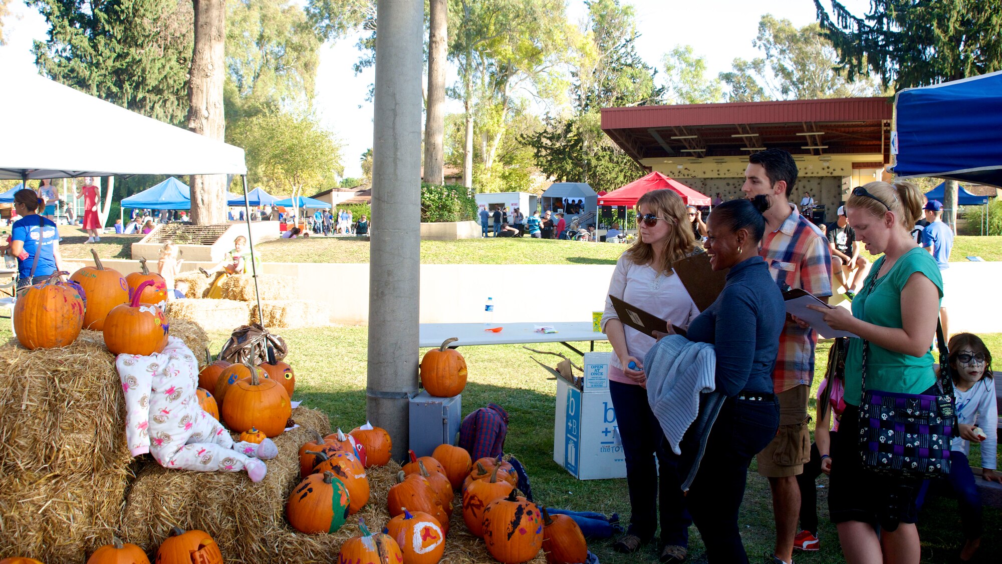 Members of Team Incirlik judge carved pumpkins during the 2013 Fall Fest Oct. 26, 2013, at Incirlik Air Base, Turkey. The pumpkin carving competition was one of many events that took place during the festival. (U.S. Air Force photo by Staff Sgt. Eric Summers Jr./Released)