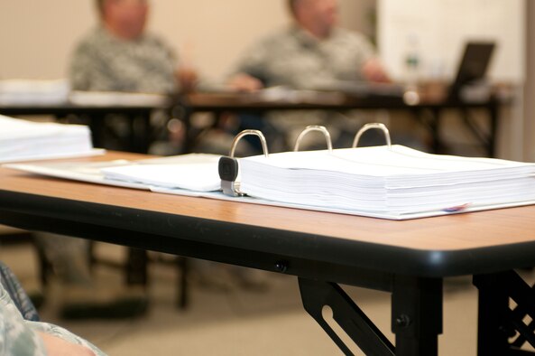 Starting this past August 2013, Otis ANGB re-vitalized its own Satellite Enlisted Professional Military Educational Site. A team of certified facilitators have been assisting to instruct a Satellite NCOA Course, in Building 158, on Tuesday and Thursday nights.  This allows students to continue to work for their employers and take care of personal and family matters. (Air National Guard photo by Tech. Sgt. Kerri Spero/Released)