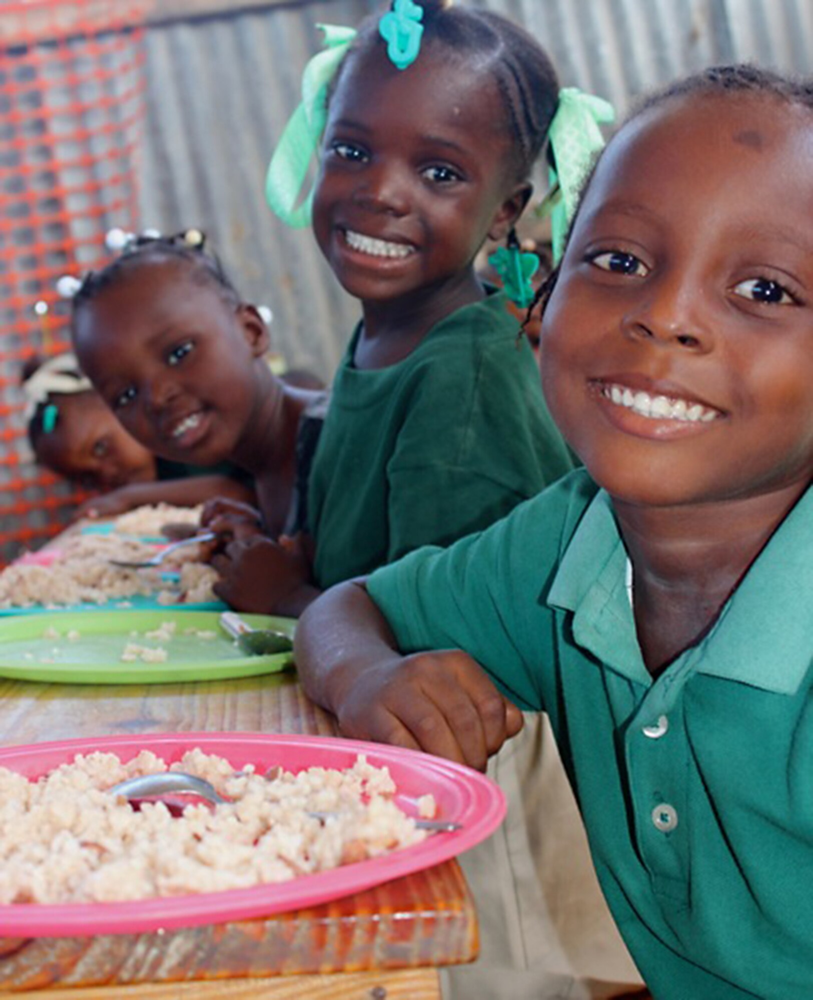 These school kids in the impoverished Haiti village of Jubilee are some of the beneficiaries of humanitarian supplies delivered by members of the 315th Airlift Wing. The wing's latest Denton mission to Haiti delivered 88,000 pounds of humanitarian cargo.  (Courtesy photo)