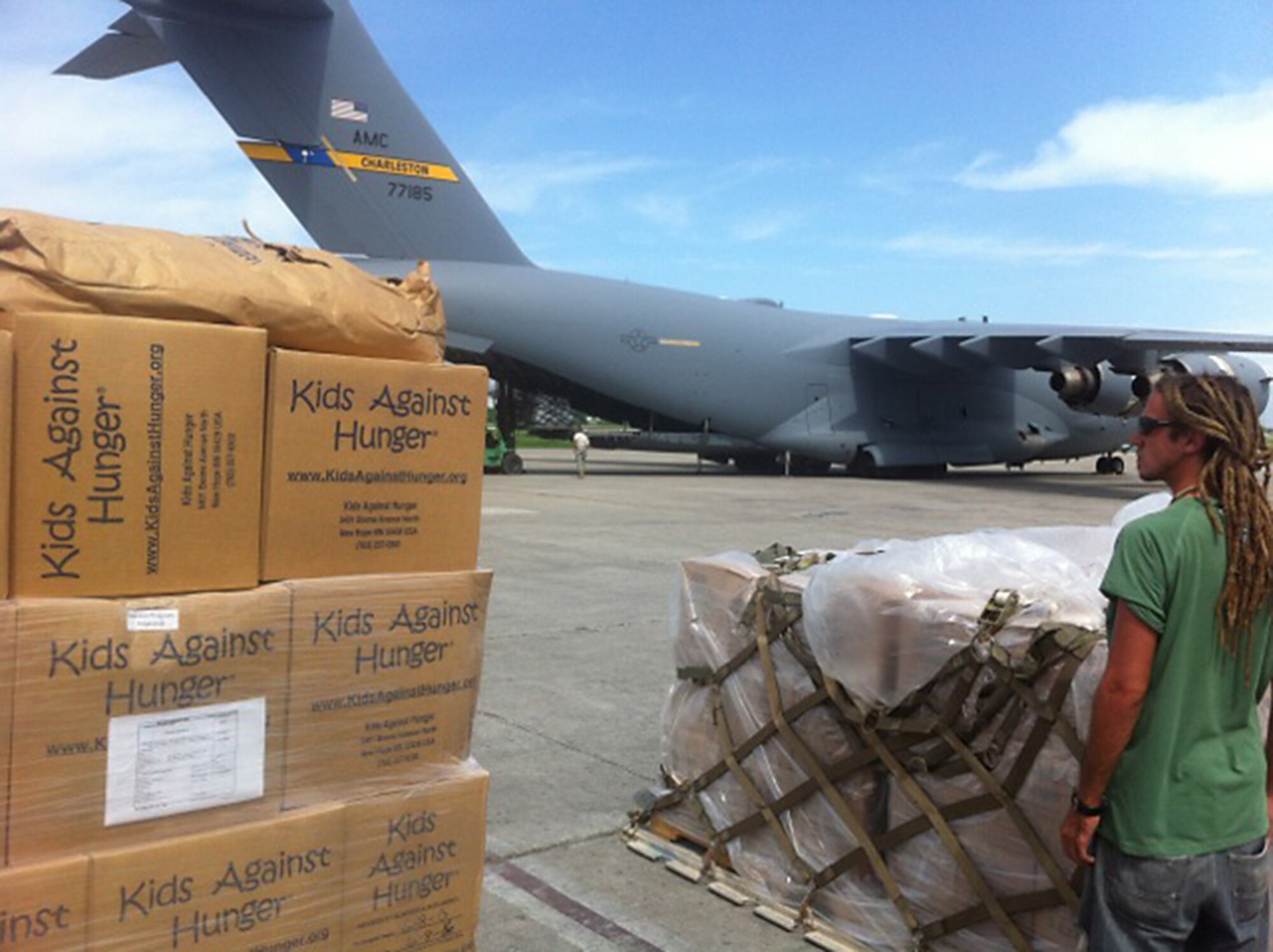 Members of the 317th Airlift Squadron delivered 88,000 pounds of humanitarian cargo to Haiti this past weekend as part of the of the Denton Program. The Denton Program allows private U.S. citizens and organizations to use space available on U.S. military cargo planes to transport humanitarian goods to countries in need, including: agricultural equipment, clothing, educational supplies, food, medical supplies and vehicles. (Courtesy photo)
