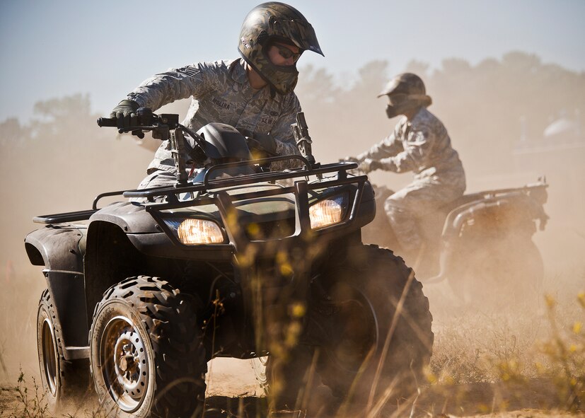 Staff Sgt. Robert Molina, of the 96th Ground Combat Training Squadron, practices sharp turning during an ATV training class Oct. 25 at Eglin Air Force Base, Fla.  Approximately 20 Airmen from the 96th Security Forces Squadron and the 96th Ground Combat Training Squadron received the training over two days.  The new riders learned riding fundamentals and even some complicated techniques during the four-hour course. (U.S. Air Force photo/Samuel King Jr.)