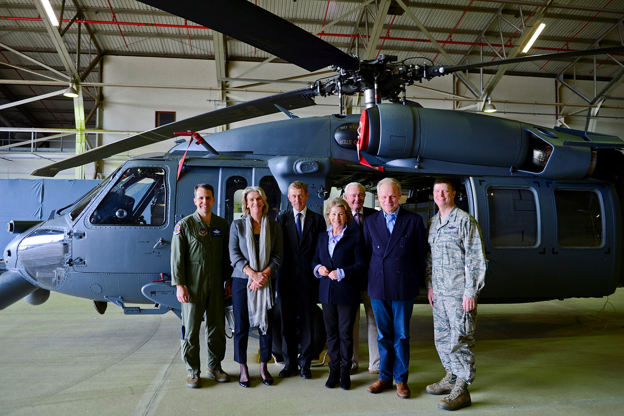 Lt. Col. John Orchard, 492nd Fighter Squadron commander (far left), Col. Kyle Robinson, 48th Fighter Wing commander (far right), and local High Sheriffs and spouses pose in front of an HH-60G Pave Hawk during the Annual High Sheriffs’ visit, Oct. 23, 2013, at Royal Air Force Lakenheath, England. The High Sheriffs’ Annual visit was held to inform the local High Sheriffs about military operations and the unique features of the U.S. Air Force. (U.S. Air Force photo by Dawn M. Weber/Released)