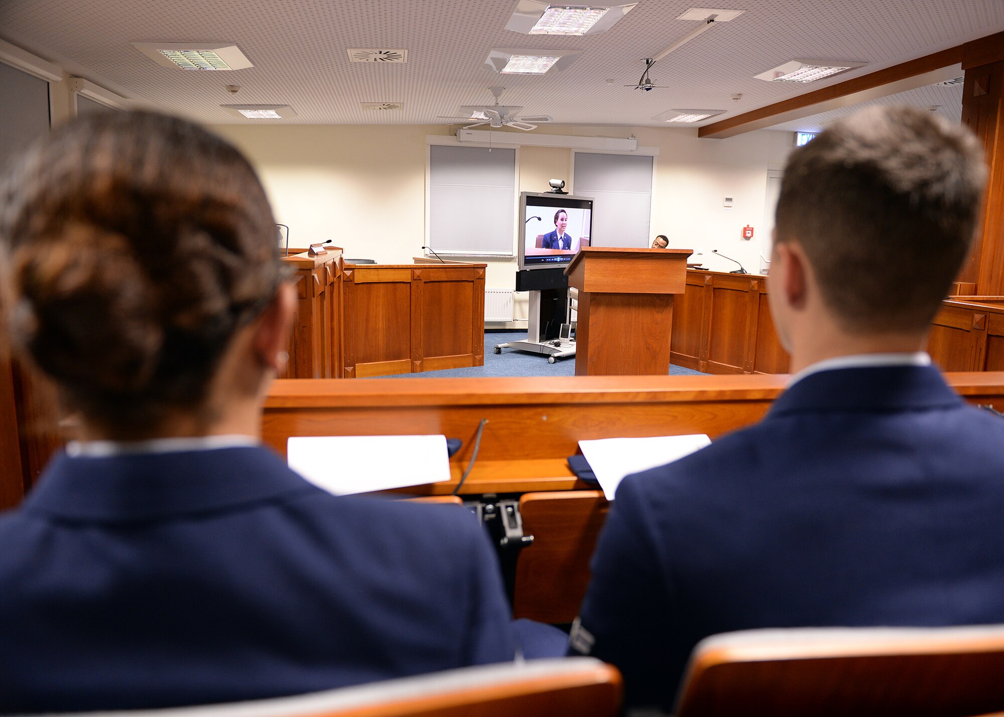 SPANGDAHLEM AIR BASE, Germany -- Members of a jury panel view a taped statement from a plaintiff at the 52nd Fighter Wing legal office courtroom Oct. 24, 2013, in Spangdahlem's interactive sexual assault prevention campaign, "Got Consent?" The legal office selected jury panel members at random from a pool of new U.S. Air Force Airmen currently enrolled in or recently graduated from the base's initial military familiarization class. (U.S. Air Force photo by Staff Sgt. Daryl Knee/Released)