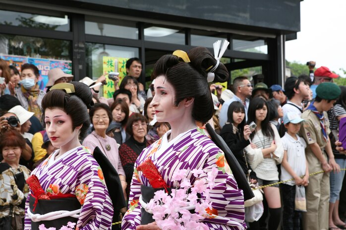 on facebookShare on twitterShare on emailShare on printMore Sharing Services0Two station residents, dressed as lady followers, walk in the final gala across the Kintai Bridge and through Kintai park April 29, 2012 as part of the Sankin-kotai, the Daimyo's annual March through Edo. During the age of Feudal Japan, each Daimyo (Japanese feudal lord) was required by the Tokugawa Shogunate to reprt at least every other year in the capital city of Edo, now Tokyo.