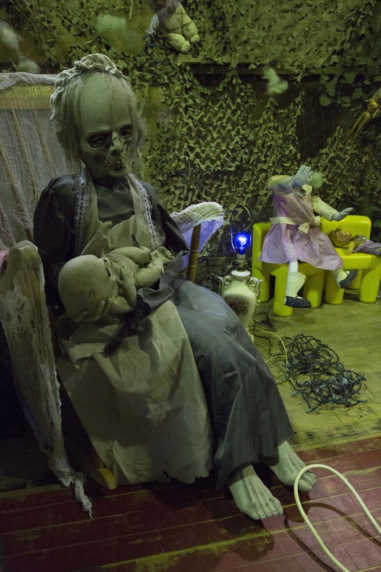 A Terror Town actor puts his best face forward to create a horrifying environment at the Area 3 Gym aboard Marine Corps Base Camp Lejeune. Terror Town is an event hosted by Marine Corps Community Services to spread Halloween frights and gather screams. The attraction features a haunted environment sure to scare your socks off.