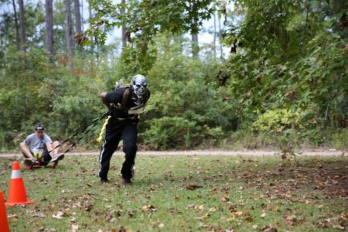 Marines from team “Geek Squad” compete in the sled pull portin of Station Cherry Point’s All Terrain Unit Competition Oct. 25 at the Piranha Pit. Eighteen teams competed in the event sponsored by U.S. Marine Corps Forces Special Operations Command.




