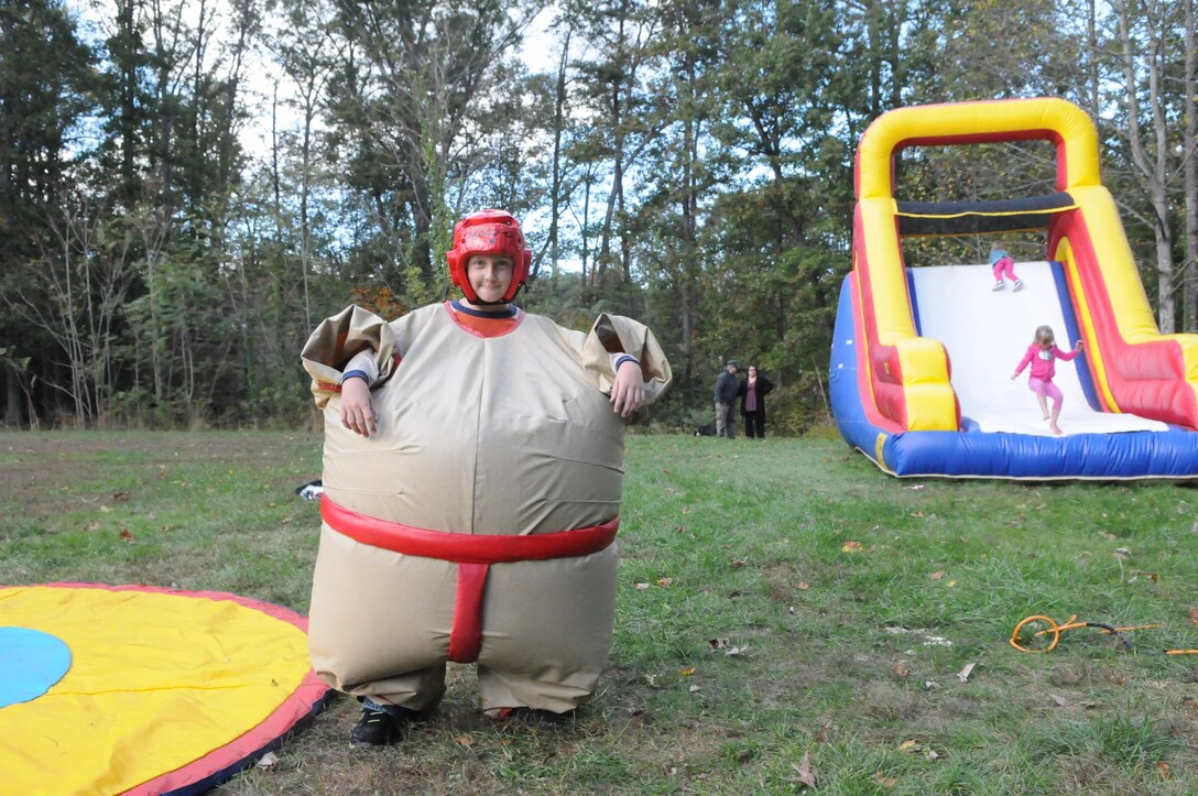 Alexander, 10, demonstrates one of the inflatable sumo suits Marine Corps Community Services donated for Marine Corps Intelligence Activity’s Family Day at Locust Shade Park on Oct. 25. 