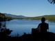 Park Attendant Overlooking Pend Oreille River at Site 13 at Albeni Cove