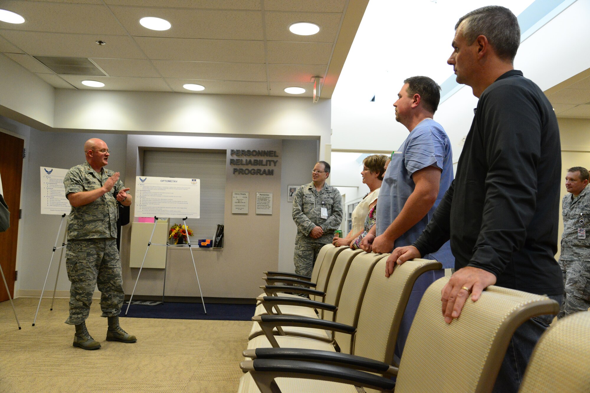 Maj. Christopher Nelson, 341st Medical Operations Squadron flight nurse, speaks to members of the Great Falls community during a tour of the clinic Oct. 24. Community members were shown how the medical center operates on a day-to-day basis as well as the level of care Airmen are given at Malmstrom’s facilities. (U.S. Air Force photo/Airman 1st Class Collin Schmidt)
