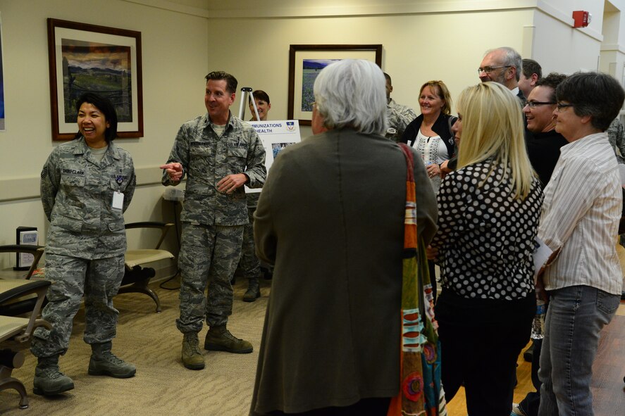 Lt. Col. John Weatherwax, 341st Medical Operations Squadron pediatric nurse (center), along with Tech. Sgt. Manuela Dabu-Clark, 341st MDOS medical technician, speak with members of the Great Falls community about the pediatric section of Malmstrom’s medical facility Oct. 24. More than 30 Great Falls community members attended the open house tour. (U.S. Air Force photo/Airman 1st Class Collin Schmidt)