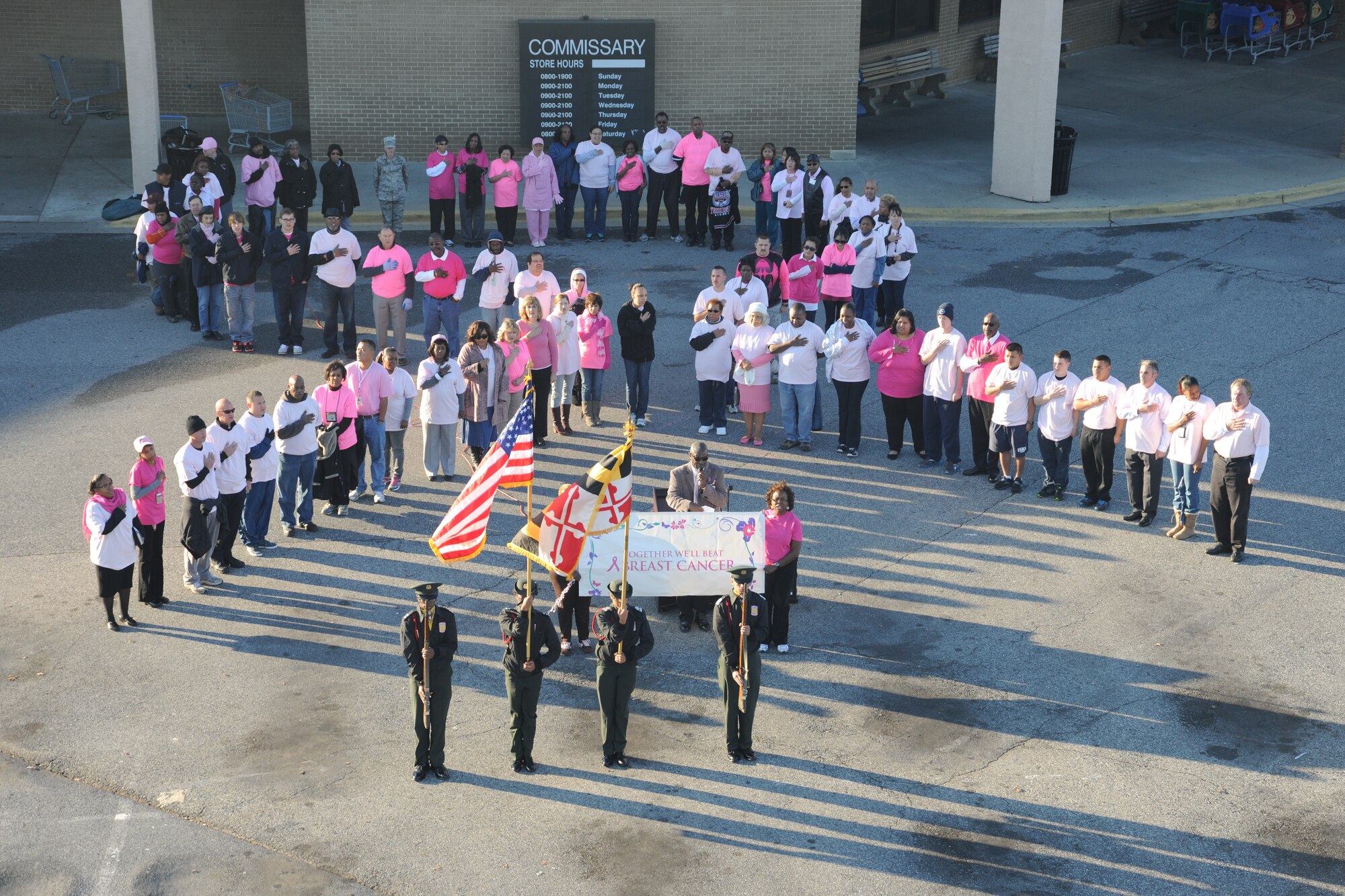 Joint Base Andrews, Md., Defense Commissary Agency employees and members of
the base community unite to form a human ribbon in celebration of Breast
Cancer Awareness month on Oct. 25, 2013. Forestville, Md., Military Academy
Army JROTC students performed the Presentation of the Colors before the
ceremony commenced. (U.S. Air Force photo/Airman 1st Class Joshua R.M.
Dewberry)
