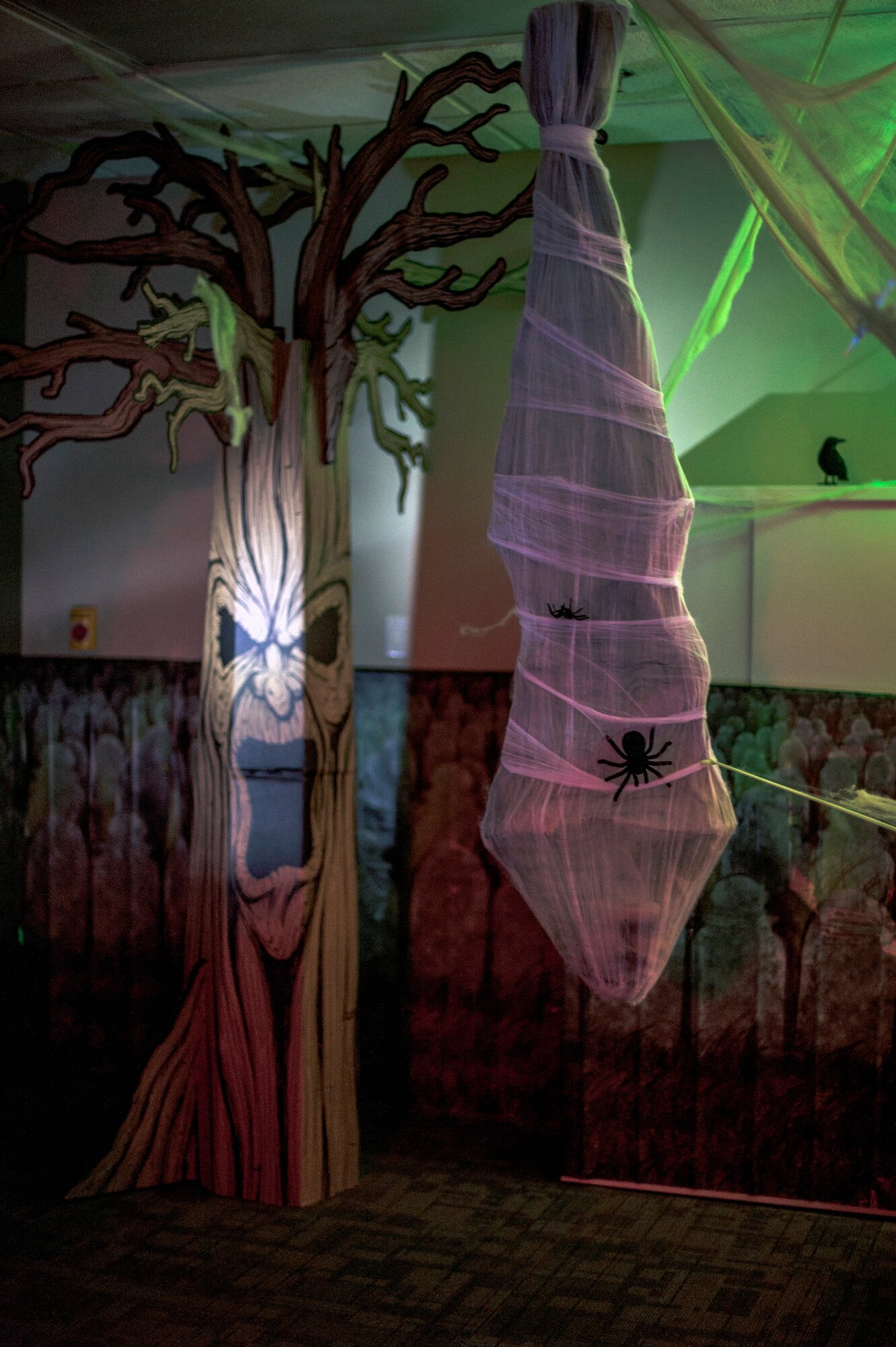 A corpse hangs near a haunter tree at the 366th Logistics Readiness Squadron quality assurance section, Mountain Home Air Force Base, Idaho, Oct. 31, 2013. The LRS held a Halloween decorating contest between various sections of the squadron, which were judged by base first sergeants. Most of the squadron participated in the contest, which was organized by Staff Sgt. Charis Ford, LRS Power Track NCO-in-charge. (U.S. Air Force photo by Master Sgt. Kevin Wallace/RELEASED)